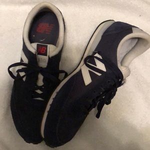 Navy blue new balance sneakers